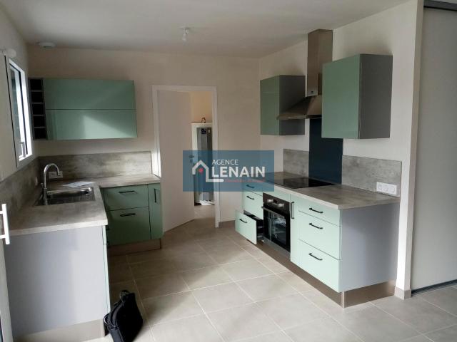 maison de plain pied 90 m² comprenant salon, cuisine.