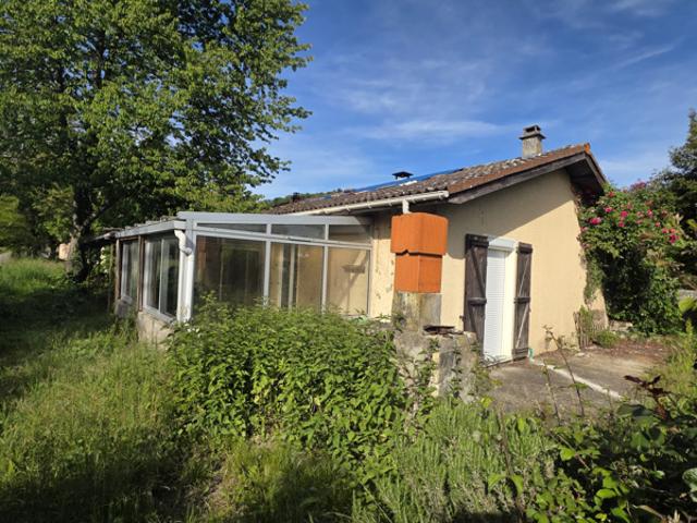 Maison de plain pied à fort potentiel sur 1 294 m2 de terrai