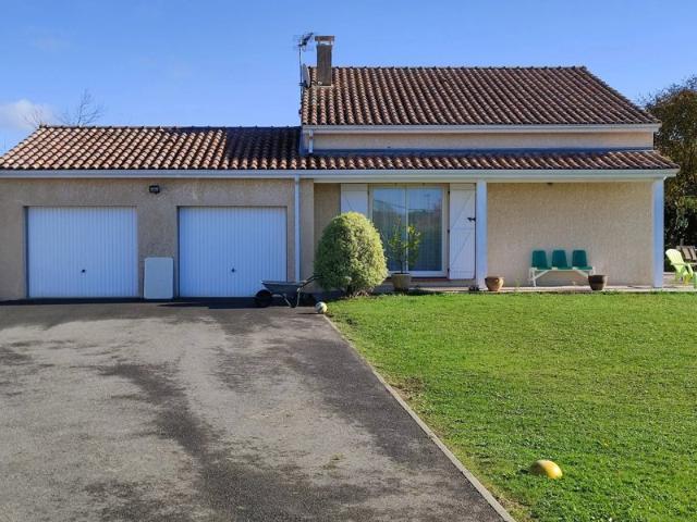 Maison de plain pied à vendre secteur SAINT GAUDENS avec quatre chambres et un terrain de 1212m²