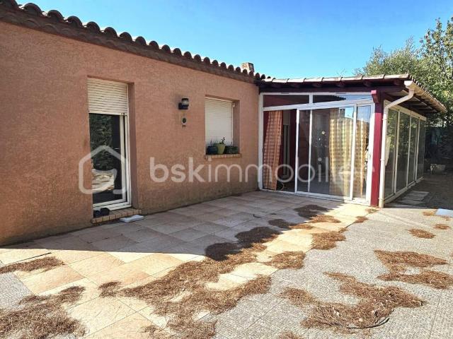 Maison de plain pied avec jardin, garage et 3 chambres