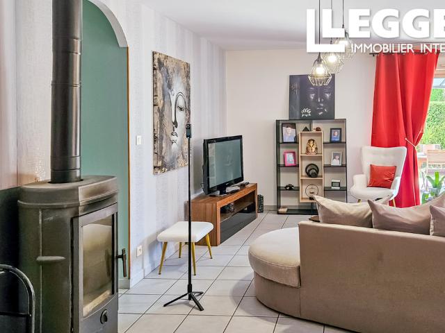 Maison de plain pied avec jardin privé et commodités à distance de marche