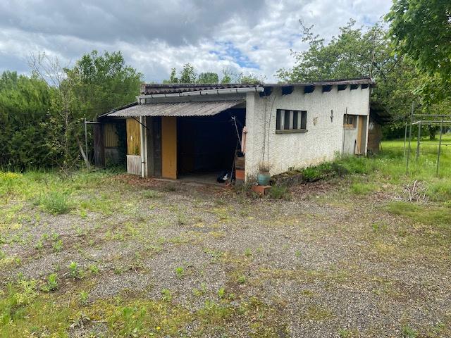 Maison de plain pied de 1970 avec annexes sur terrain de 3000 M2