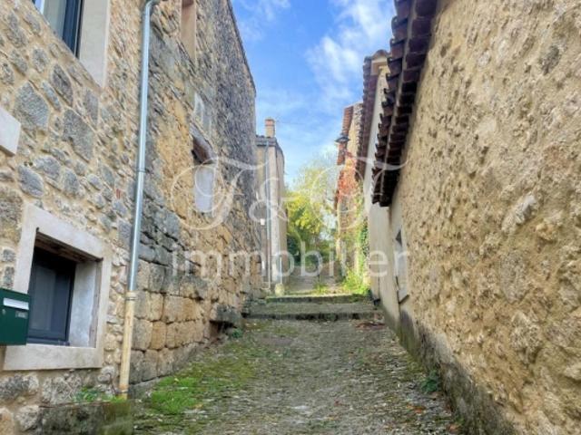 Maison de village traversante