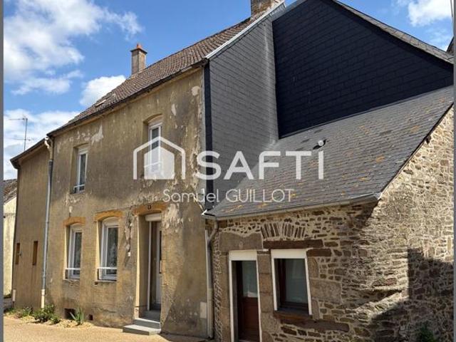 Maison de ville en pierre avec grand garage