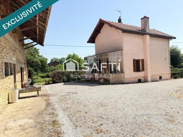 Maison d'habitation et dépendances de caractère au fort potentiel