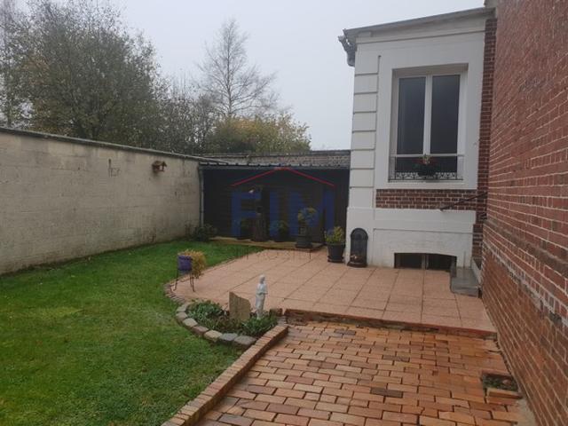 Maison divisée en 3 logements