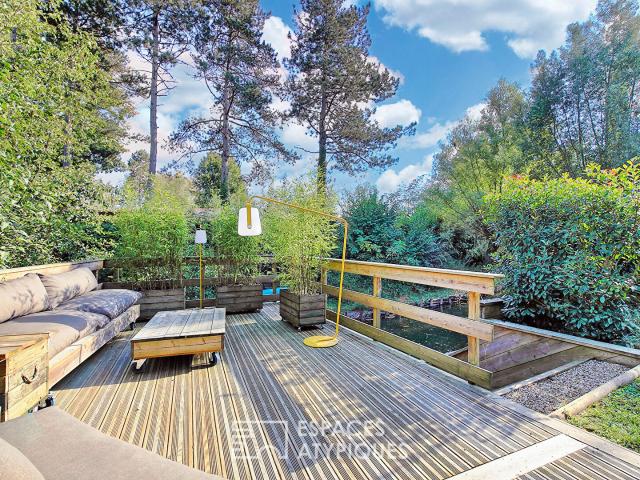 Maison en bois avec terrasse xxl et son jardin