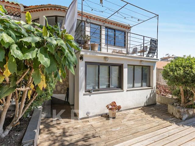 Maison en bord de mer avec jardin