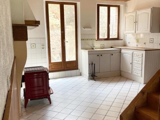 Maison en briques rouges avec cour secrète