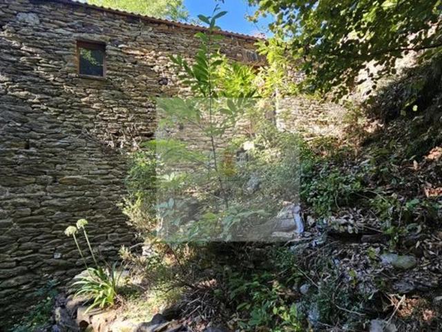 Maison en schiste et terrain constructible