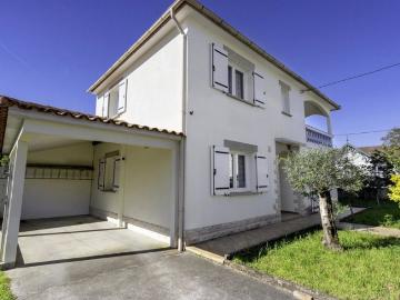 Maison familiale avec jardin proche centre ville