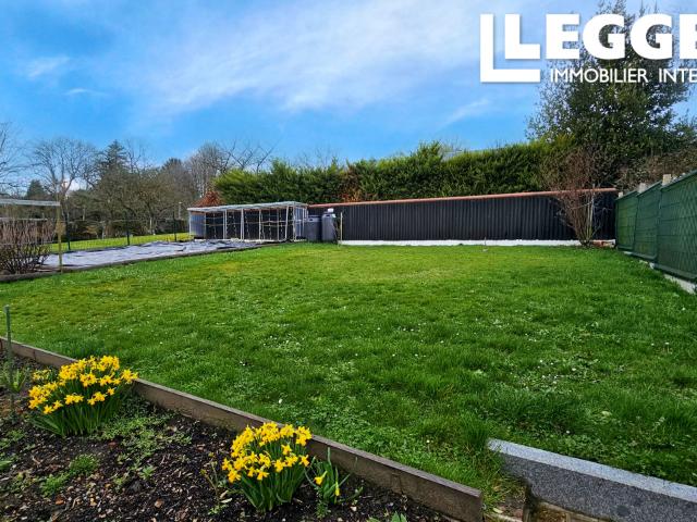Maison familiale avec terrasse, garage et potentiel d’agrandissement