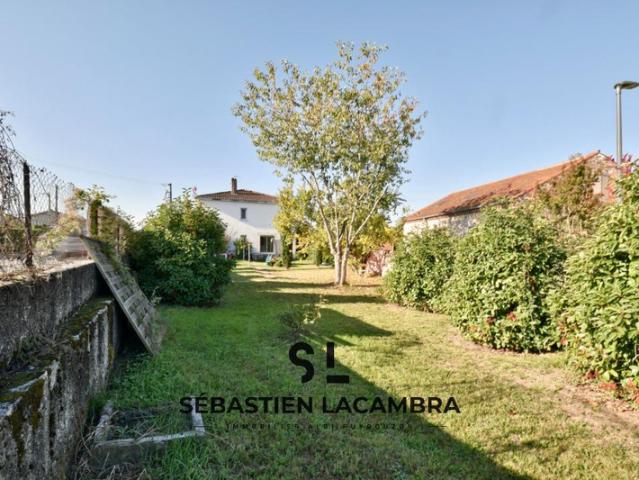 Maison familiale T6 5 chambres Jardin clôturé et deux te