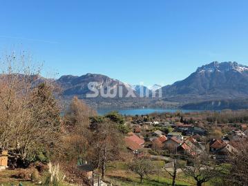 Maison individuelle offrant un panorama exceptionnel sur le lac et les massifs