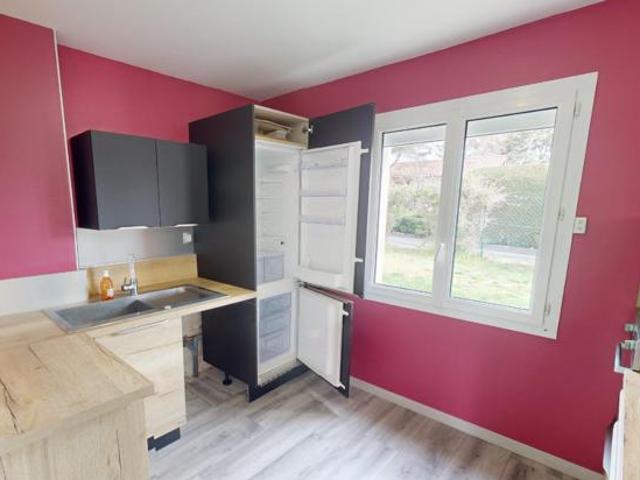 Maison individuelle avec garage et terrain