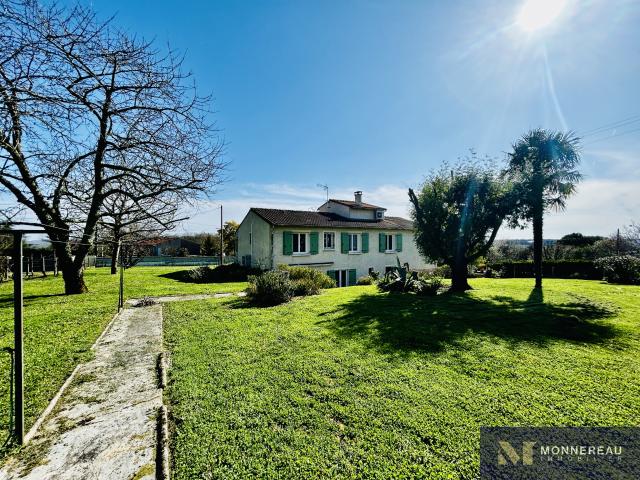 MAISON INDIVIDUELLE AVEC JARDIN ET GARAGE