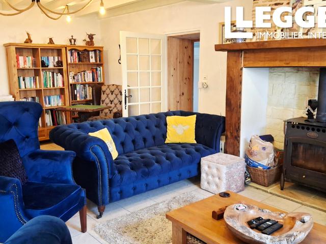 Maison individuelle, comprenant 3 chambres, 3 SDB, garage, atelier, studio et 1.6 hectare de terrain