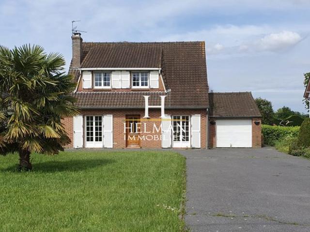 Maison individuelle de 9 pièces en semi plain pied avec garage
