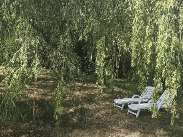 Maison individuelle récente avec garage et magnifique terrain arboré de 3000 m2
