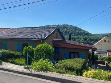 Maison mitoyenne avec garage et jardin