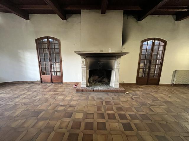 Maison mitoyenne avec potentiel d'agrandissement Quartier