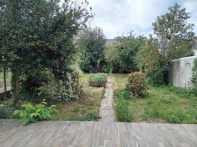 Maison semi individuelle avec jardin et garage