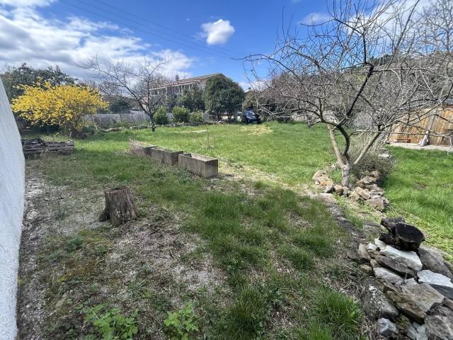 Maison P5 de plein pied sur 1325 m² de jardin arboré
