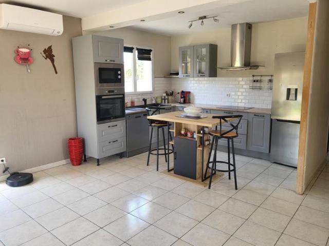 Maison plain pied avec garage et piscine