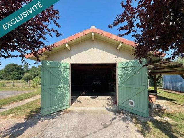 MAISON PLAIN PIED AVEC GRAND GARAGE ET TERRAIN CLOS