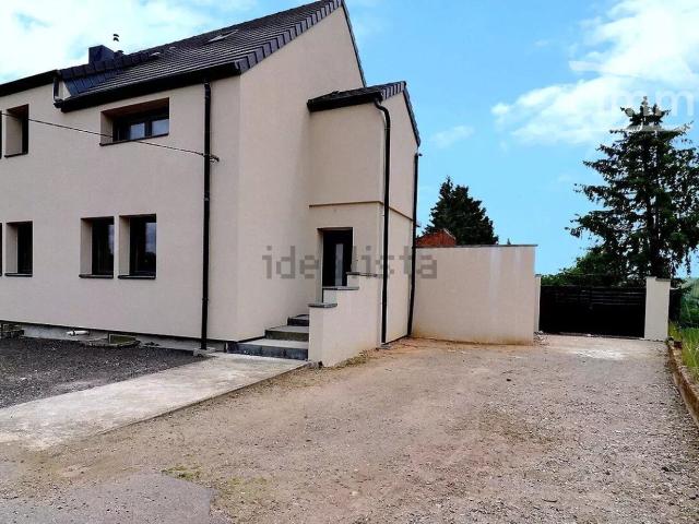 Maison, Woustviller