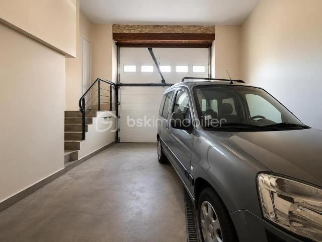 Maison traditionnelle mitoyenne d'un coté