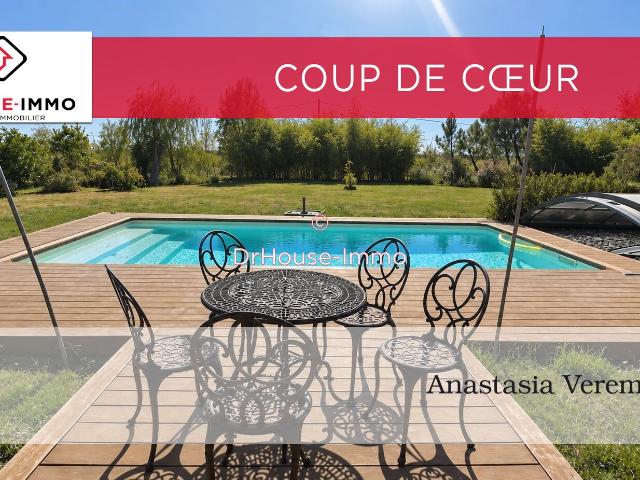 Majestueuse Maison Familiale de 8 pièces avec Jardin Paysager, Piscine et Garage à Noaillac