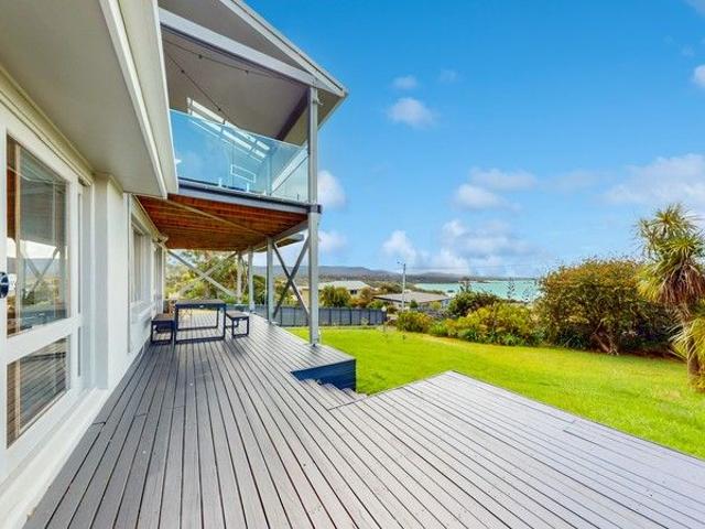 Panoramic Coastal Home with Dual Living Potential