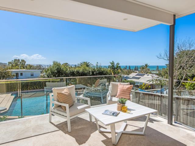 Majestic ocean views from immaculate tri level family home