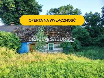 Malownicza działka z drewnianym domem do remontu 76 m²