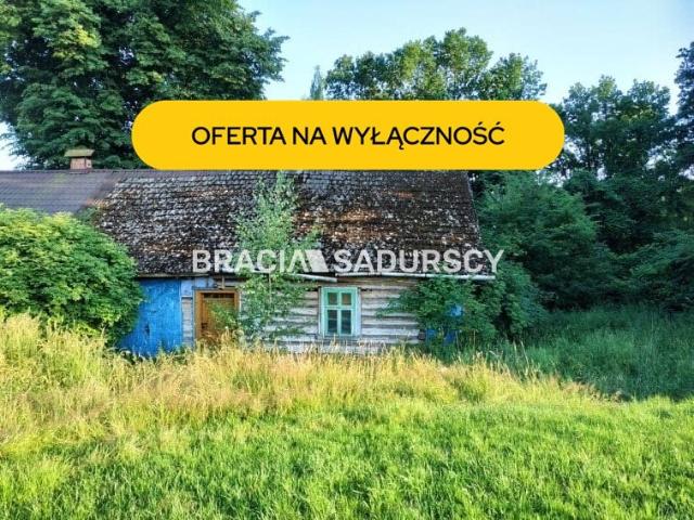 Malownicza działka z drewnianym domem do remontu 76 m²