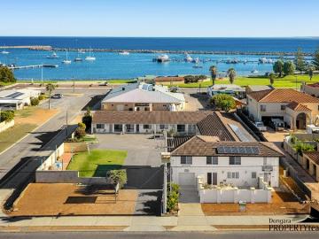 Marina Accommodation Investment | Established Business + Coastal Real Estate Opportunity