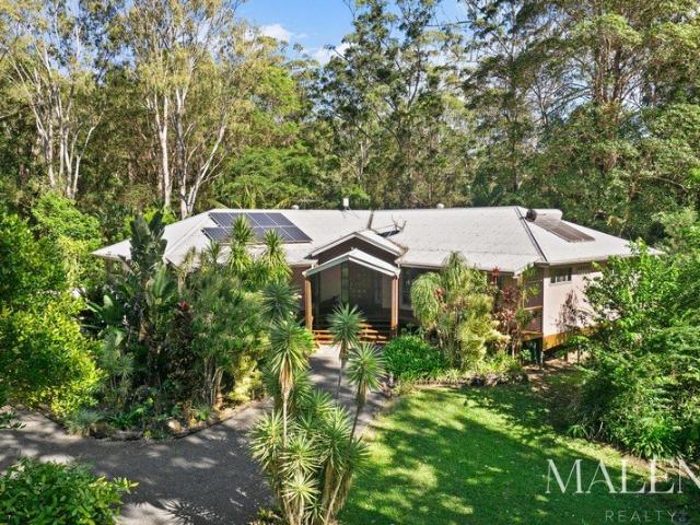 Master Built, Custom Designed Residence: Shrouded by Rainforest