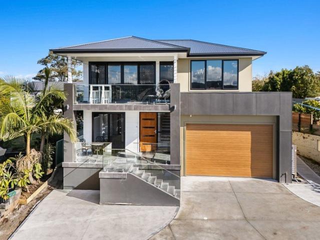 Masterfully Designed for Changing Households, Framed by Lake Macquarie