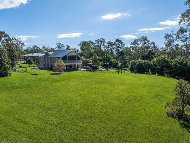 Masterfully Renovated Queenslander on Five Picturesque Acres