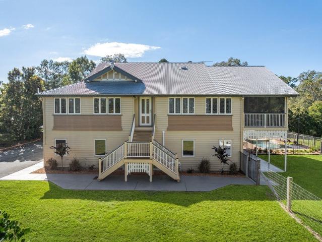 Masterfully Renovated Queenslander on Five Picturesque Acres