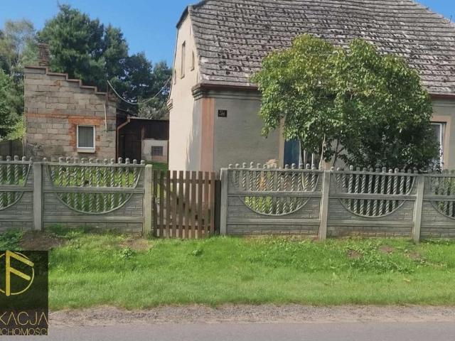 Dom do remontu z dużą działką w Masanowie