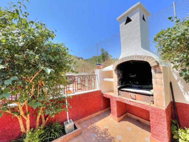 Masía en venta en Benamocarra. Encantadora finca rústica con vivienda y producción de aguacates en Benamocarra. Masías.