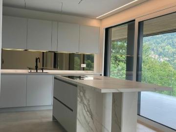 MASSAGNO · DESIGN MODERNO E GRANDE GIARDINO PRIVATO · VIVERE LUGANO IN MODO ESCLUSIVO