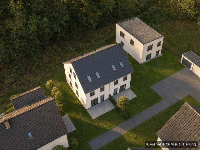 Massiv + individuell: DHH mit Garten in Nürnberg Worzeldorf