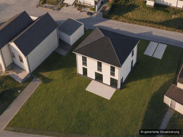 Massiv + individuell: Einfamilienhaus mit Garten in Wachendorf