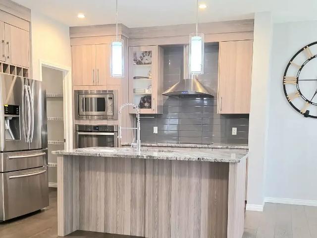 Massive 4 Bed + Den in Nolan Hill NW — 4 Bedrooms+ Den Main Floor