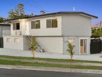 Massive 9 Bedroom Dual Living Opportunity Multiple Families or High Yield Investment in Central Logan