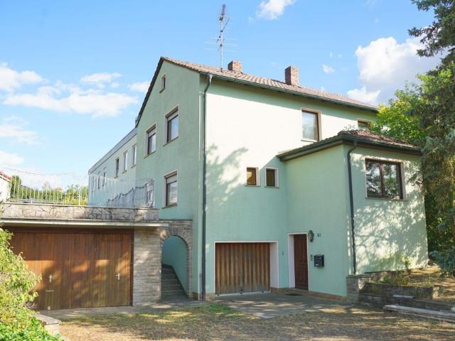 Massivhaus in ruhiger Ortsrandlage – 2.365 m² Grundstück mit 1.2