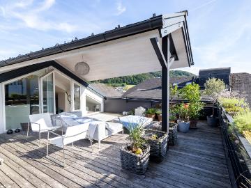 MATTSEE | Luxuriöse Loft Wohnung in Seenähe mit 360° Dachterrasse in zentraler Lage